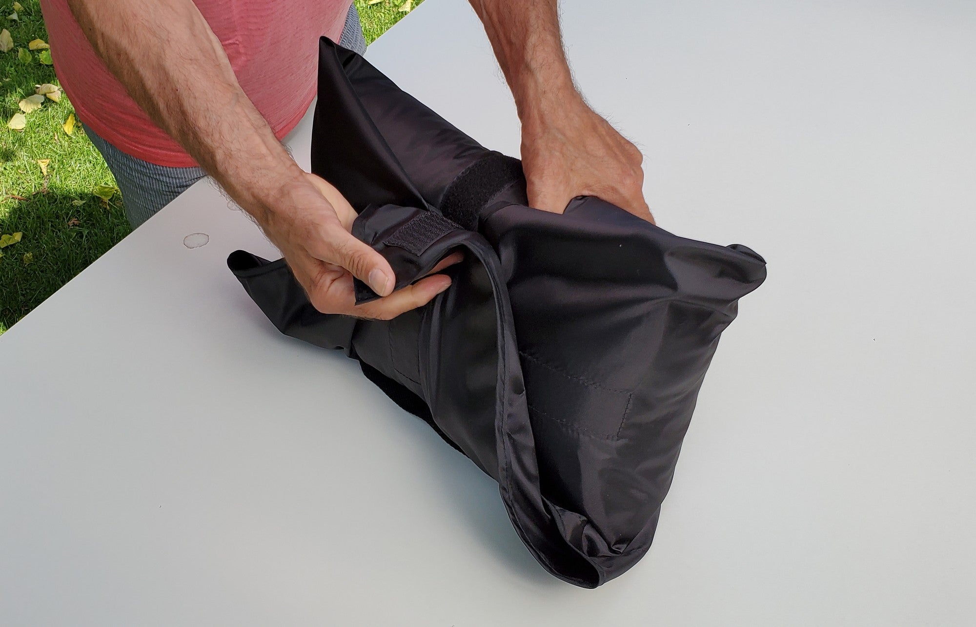 schlafsack einpacken rollen oder stopfen WrapSack